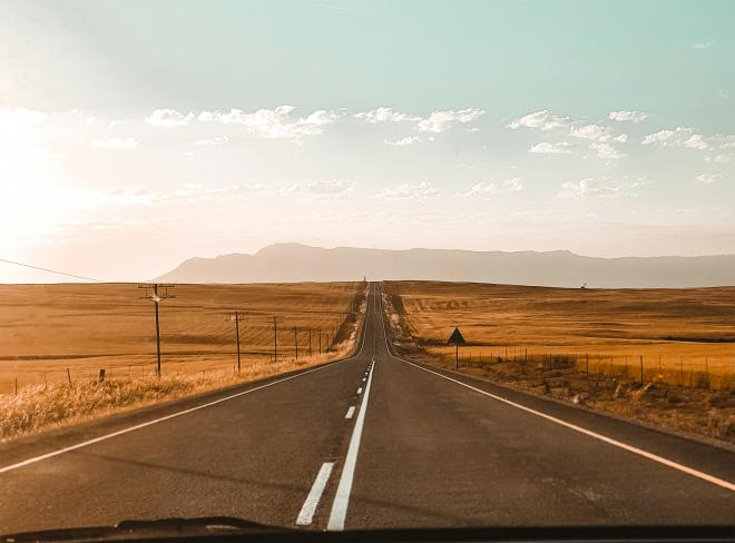 a wide open road going into the horizon